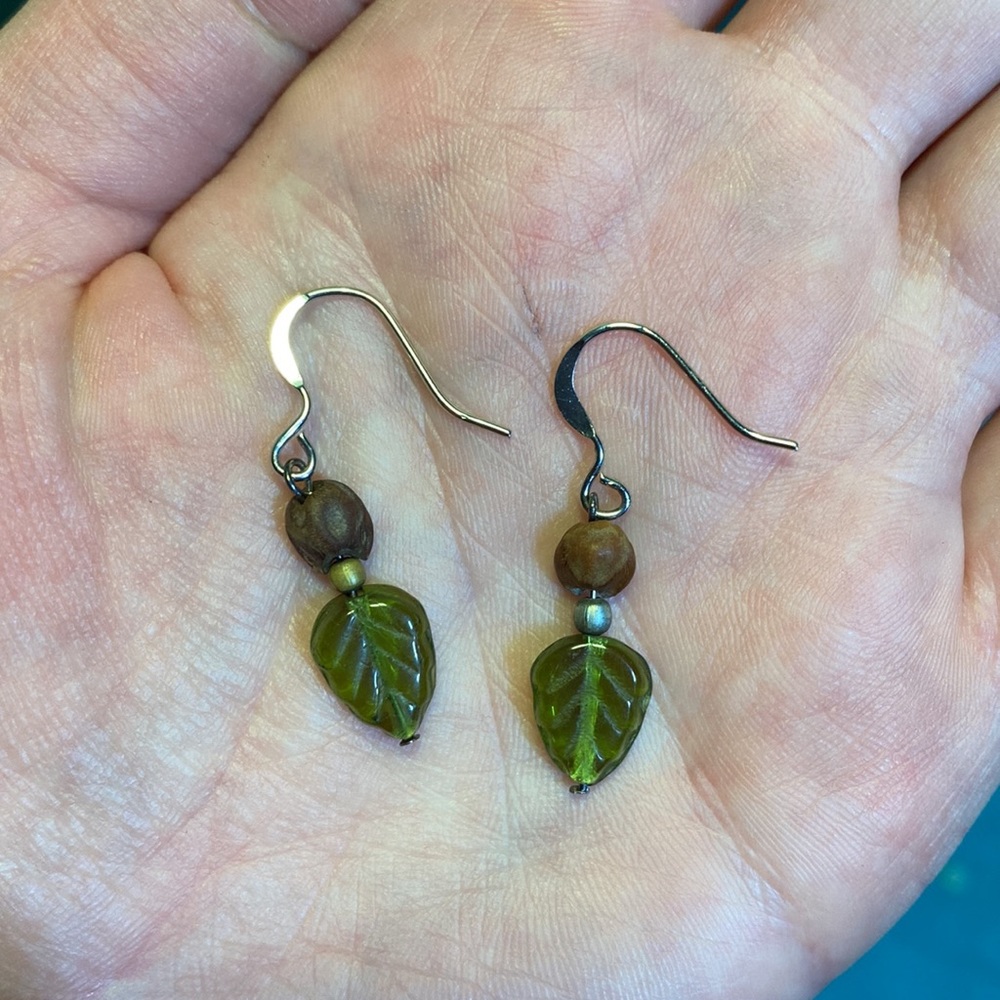Handmade green glass leaf beaded dangle earrings
